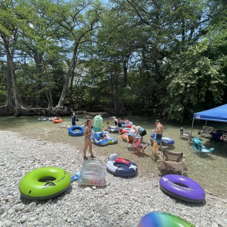 private event camp river with a crowd