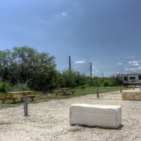 Outdoor seating with RV near by