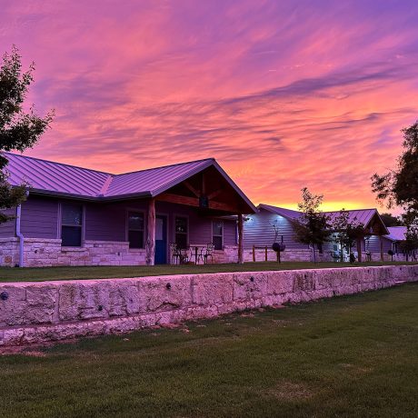 cabin exterior at sunset